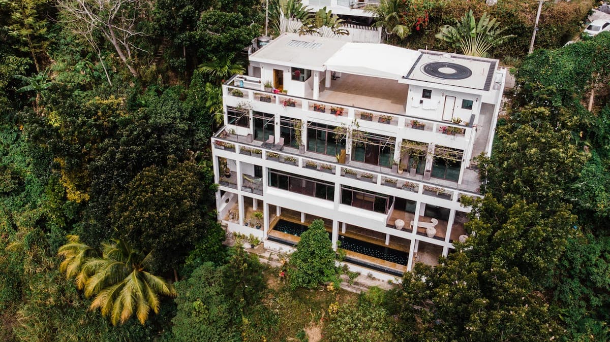 A hillside villa and pool above Cebu City, wrapped in forest at Busay